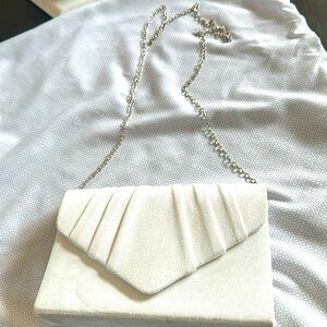 White clutch with removable silver chain